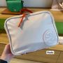 BOLSA MÉDIA DE MÃO COM ALÇA EXTRA